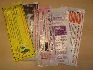 A selection of clothes collection bags received at London households in recent weeks